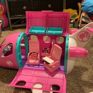 Barbie airplane with 3 adjustable seats. Missing back door. Barbie fun 4 hours.